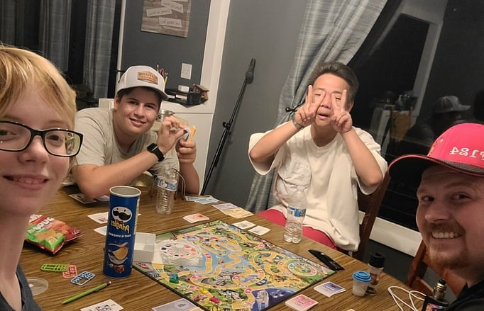 Family game night with around the table