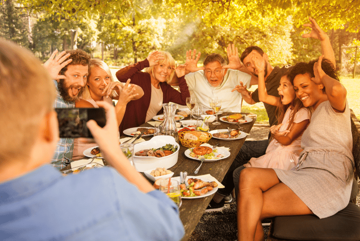 large family making silly faces for camera