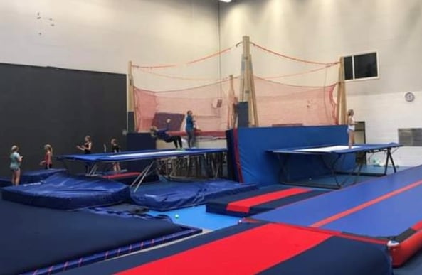 teens practicing at trampoline park