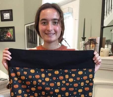 Berta with halloween pillow case