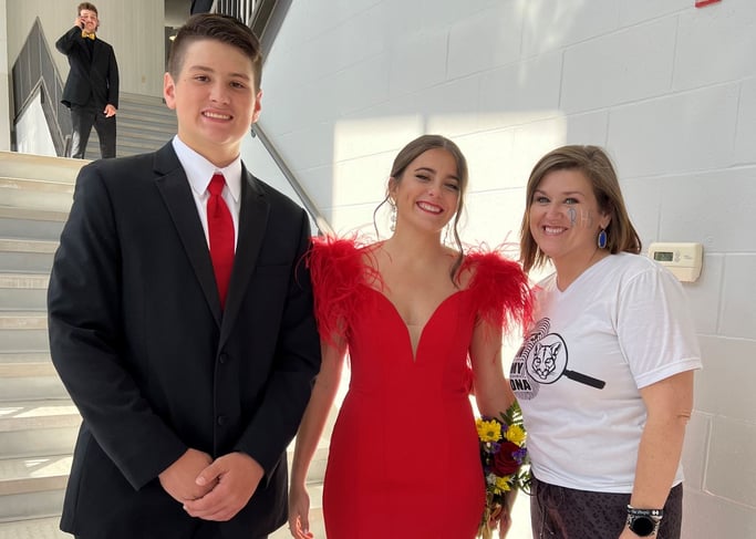 woman with homecoming couple