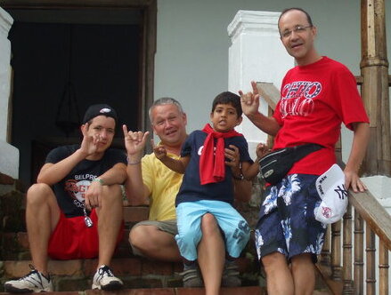 American host father with Colombian exchange student and his father