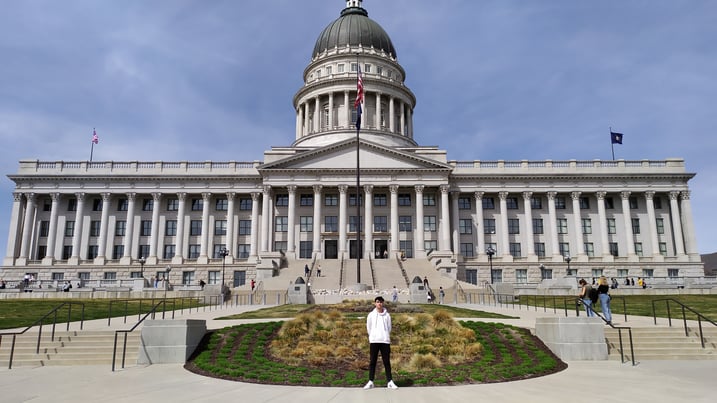 boy in front of Capitol building