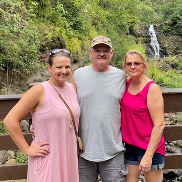 adult woman with parents