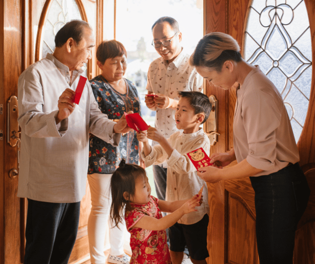 Chinese family with red envelopes