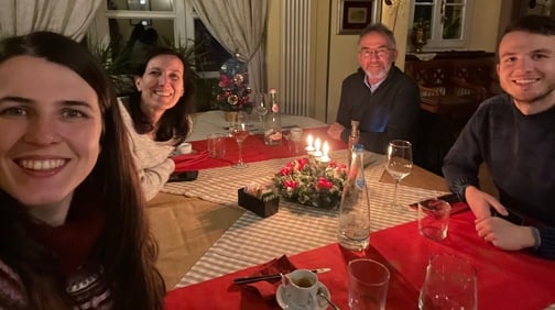 family around candlelit table