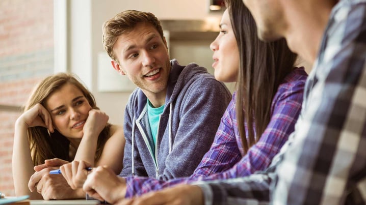 Four teens talking together