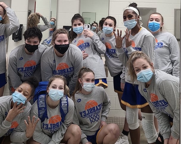 Girls basketball team in locker room