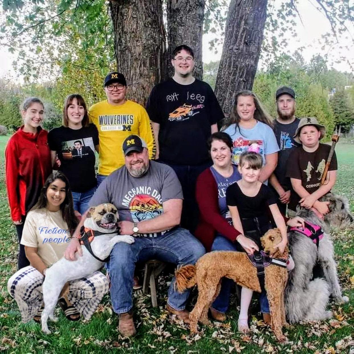 family photo in front o a tree