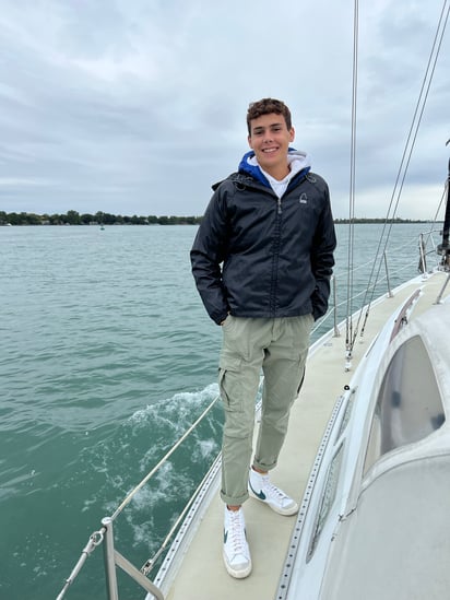Boy on boat in lake