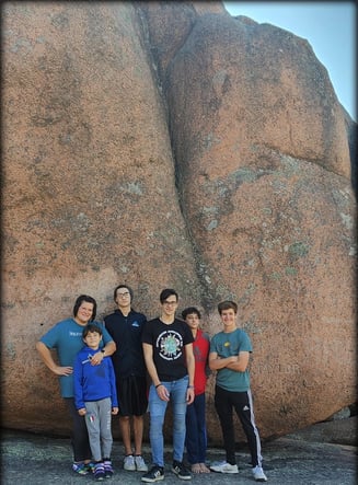 Jamie and host family in front of Elephant Rock