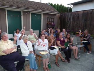 Group of families waving