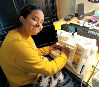 girl sewing