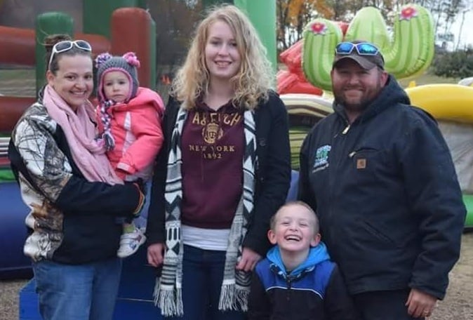 American family with German student at the park