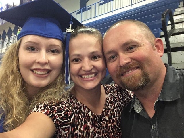 German exchange student and host parents at graduation