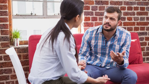 Man listening to another person