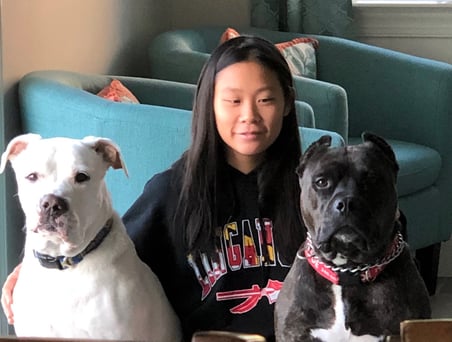 teen girl with two dogs