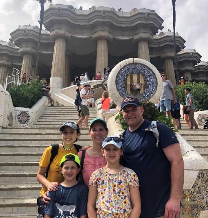 family in front of Park Guell in Barcelona