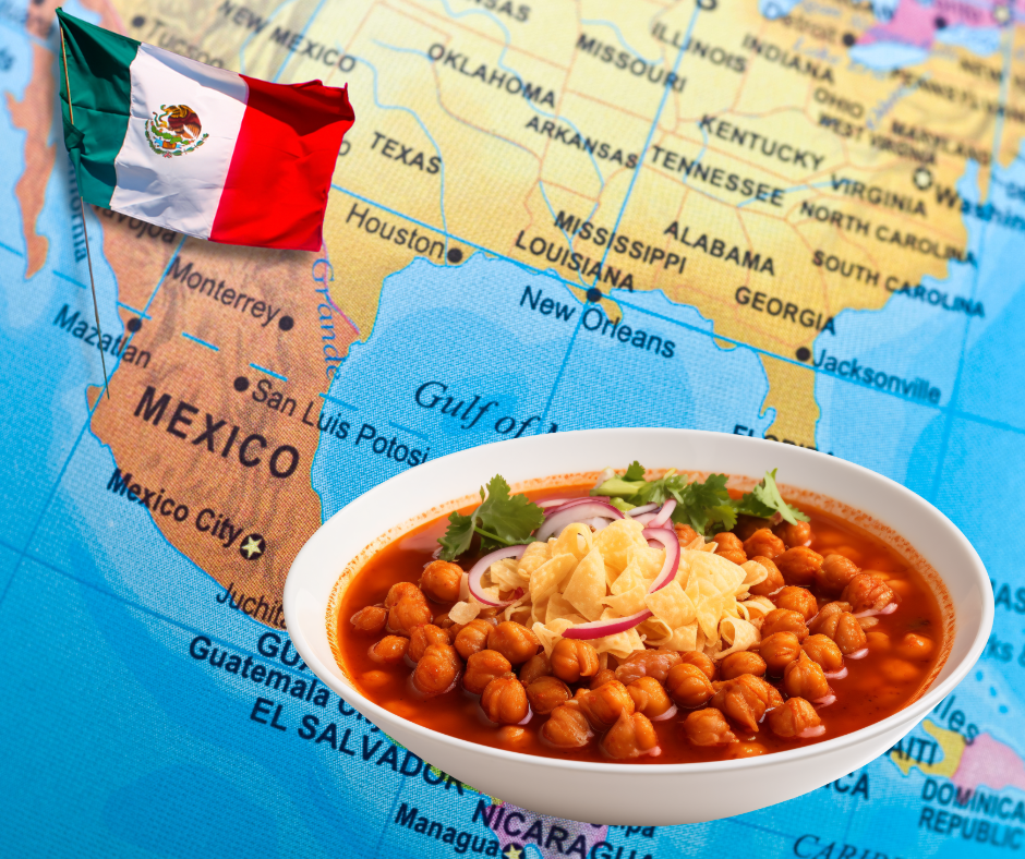 Pozole dish in front of the Mexican map and flag.
