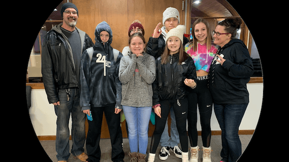 Student from Thailand with host sisters before Church retreat