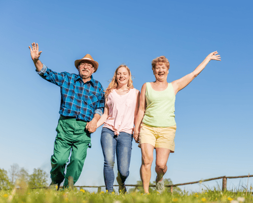 teen girl hiking with senior couple