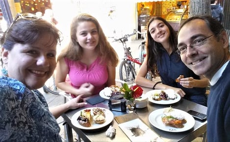 four people eating tapas