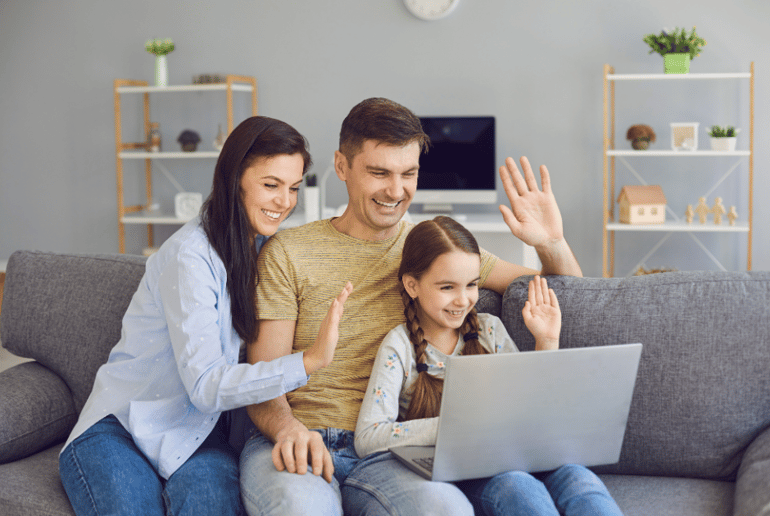 Two parents and their daughter on a video call