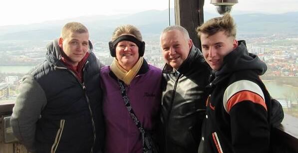 American couple with exchange student in cable car in Slovakia
