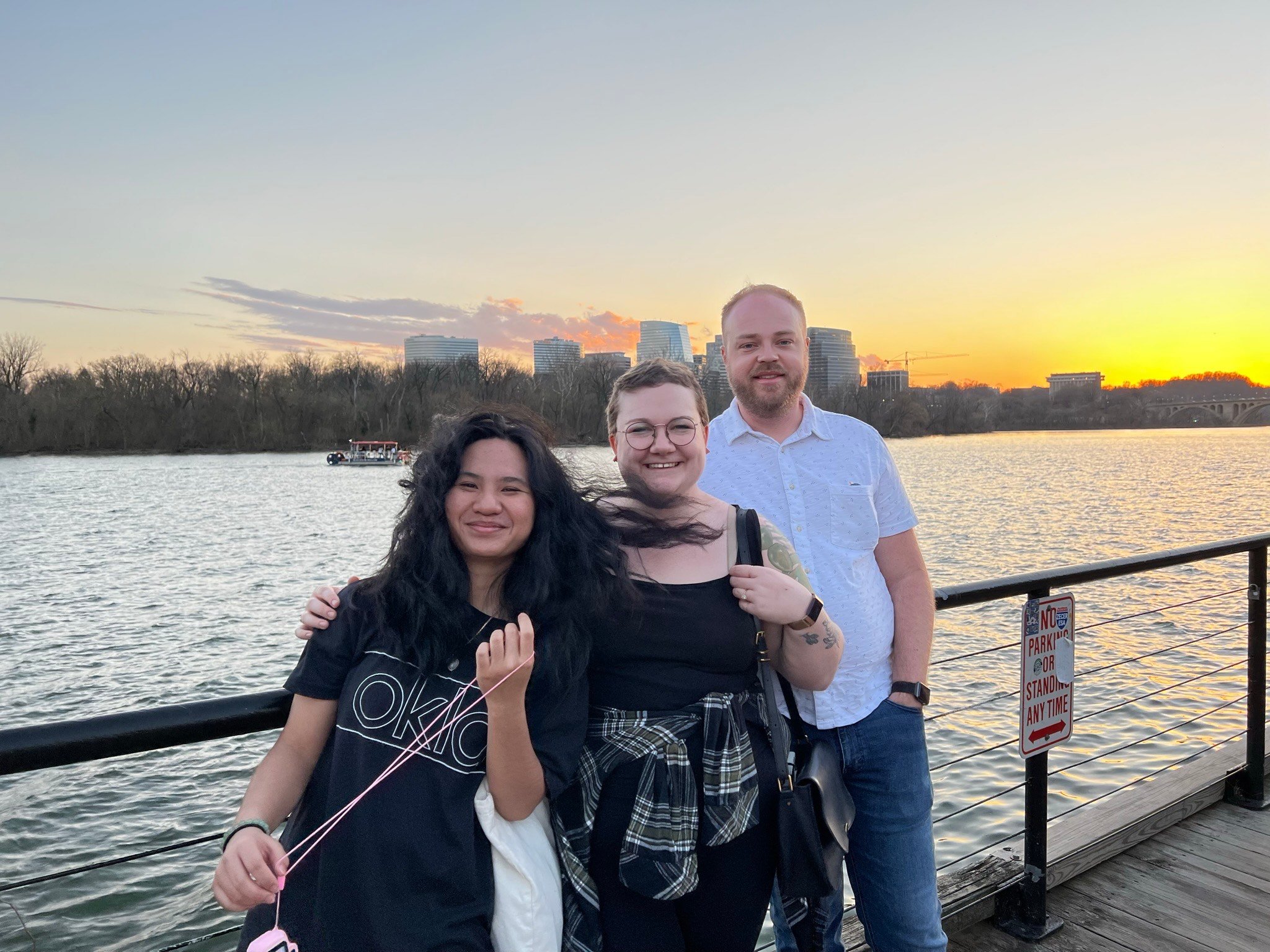 teen girl with host parents and city skyline