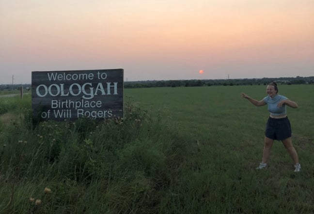 girl posing with Oohogah sign