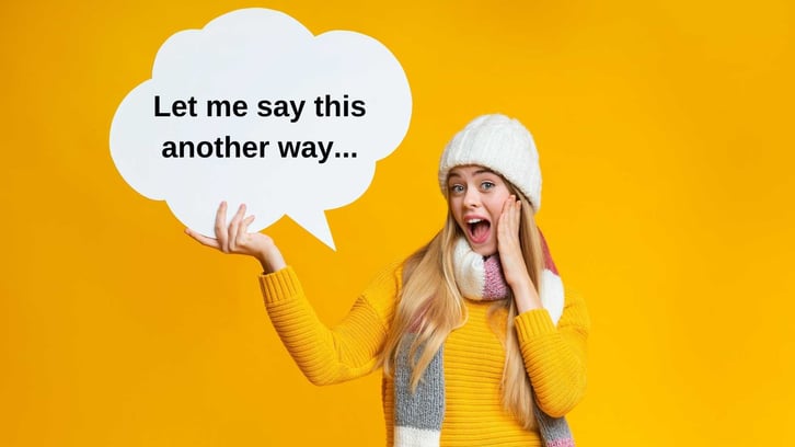 Teen girl smiling and holding a speech bubble