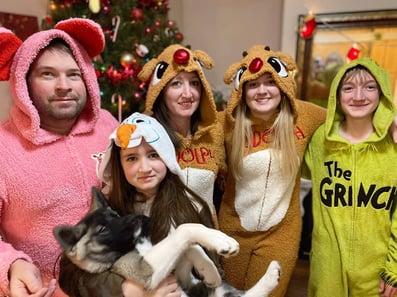 family in funny Christmas pajamas