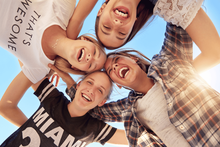 Group of teenagers smiling together