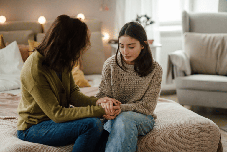Parent and teenager talking