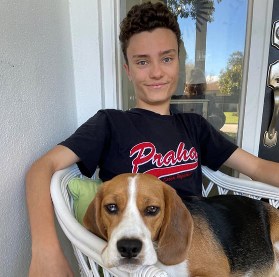 boy with beagle on lap