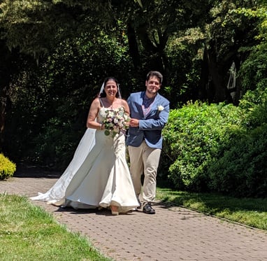 Dan walking Carla down the aisle