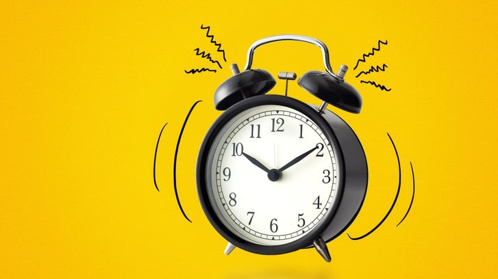 an alarm clock that appears to be ringing