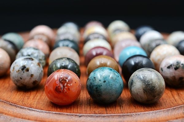 marbles arranged to play Chinese checkers