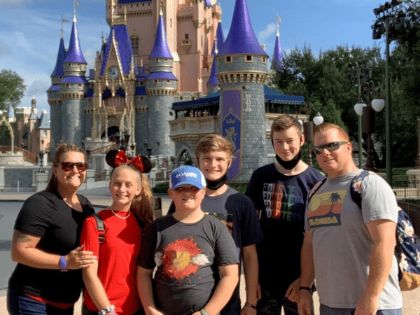 German exchange student with his host family at Disney's Magic Kingdom