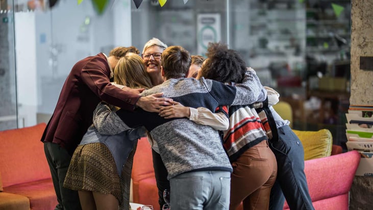 family doing a group hug