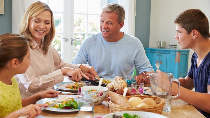 family meal with mom, dad, daughter and son