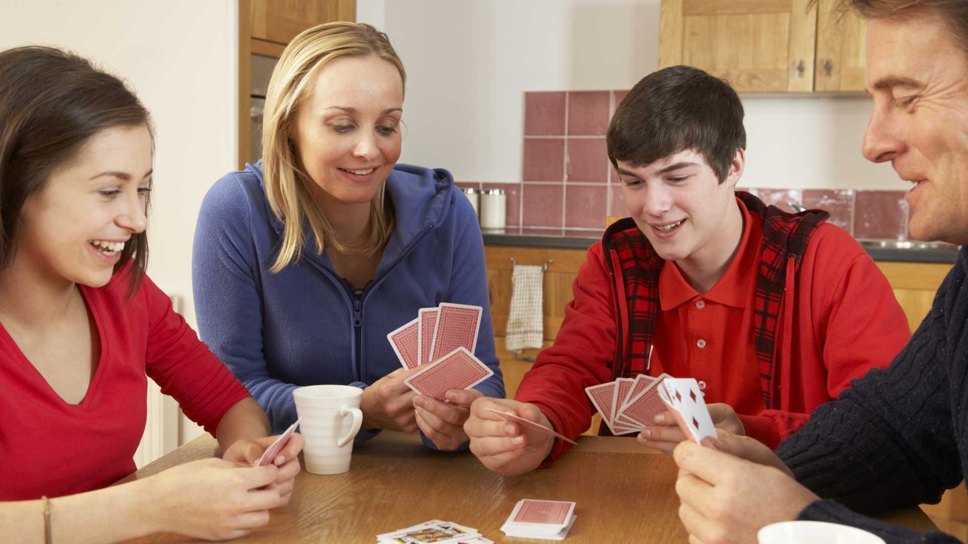 family playing cards