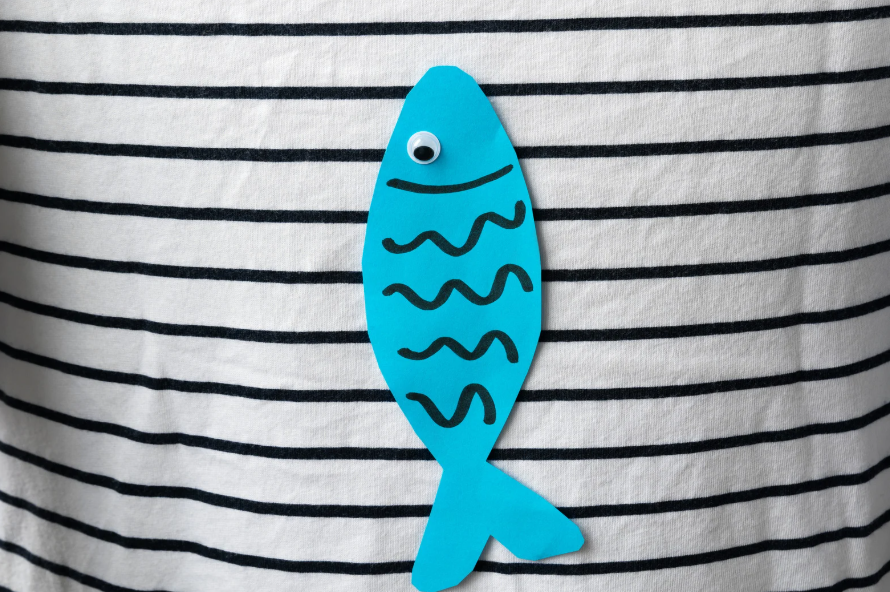 fish taped to shirt