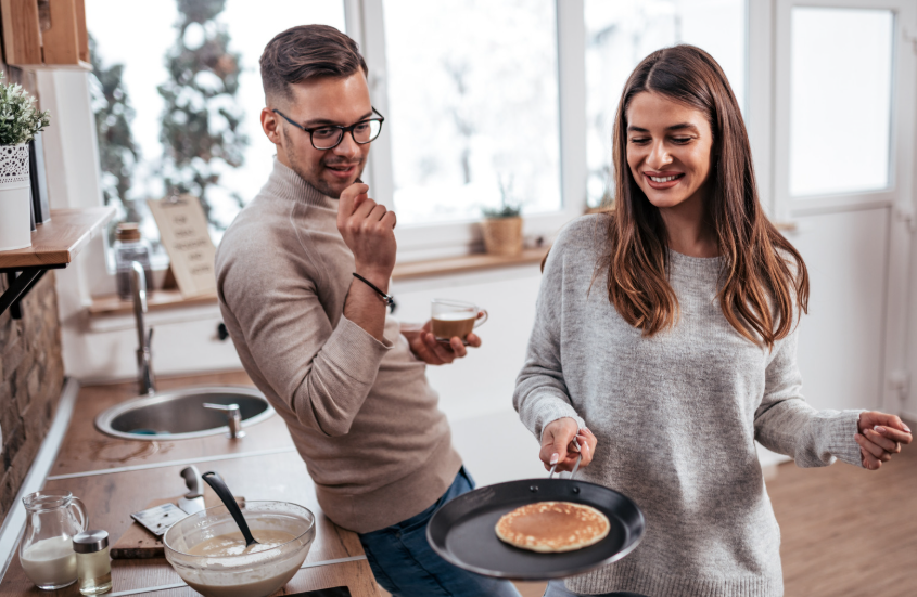 girl flipping pancake