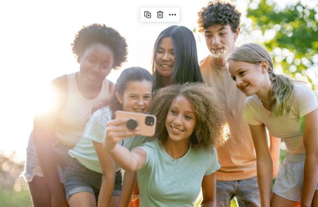 group of diverse teens taking a selfie
