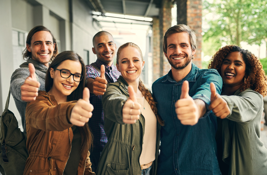 three couples giving thumbs up