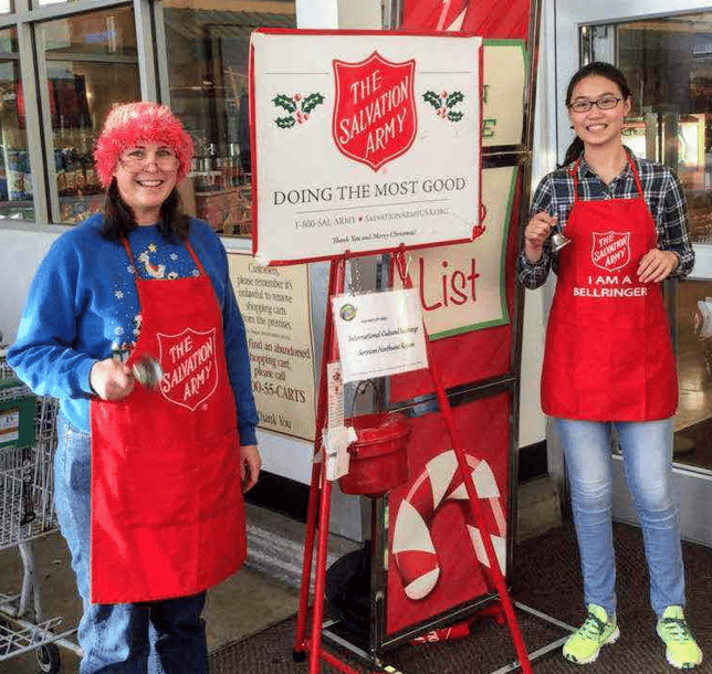 teen and mom ringing Salvation Army bells