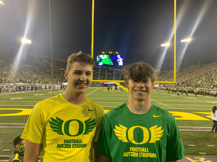 two boys at foodball game