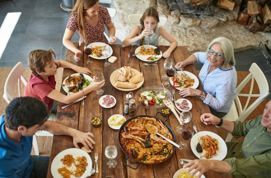 Spanish family around dinner table
