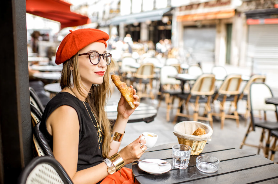 French girl with cofee and baggette